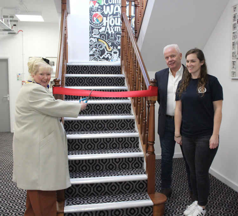 Anni Young (left) pictured just a few weeks before her sudden death at the opening of the Community Waffle House, where the defibrillator and plaque in her memory are now installed Anni Young (left) pictured just a few weeks before her sudden death at the opening of the Community Waffle House, where the defibrillator and plaque in her memory are now installed