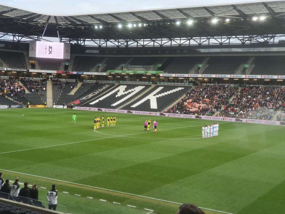 Stevenage travelled to Milton Keynes for their FA Cup first round clash on Saturday. PICTURE: The teams assemble on the centre circle to remember The Fallen prior to kick-off. CREDIT: @laythy29