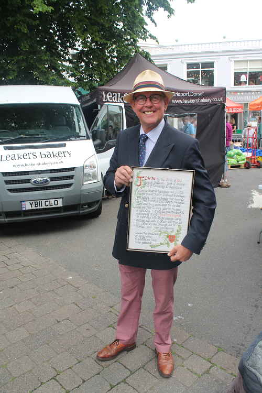 Lord of the Manor Jim Rowe pictured with the ancient charter