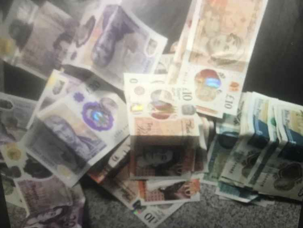 Cash and drugs were seized during the police operation