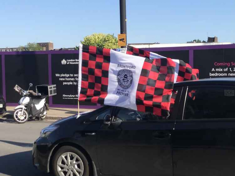 A car decked out in Bees flags