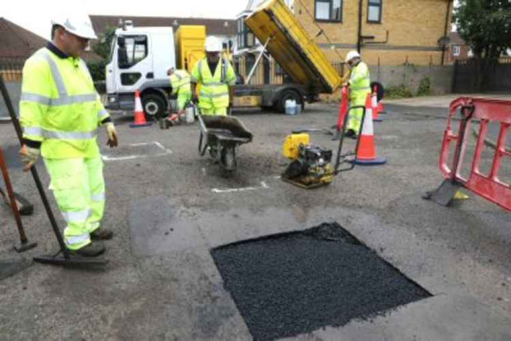 Hounslow Highways repairing a pothole. Image Credit: Hounslow Highways