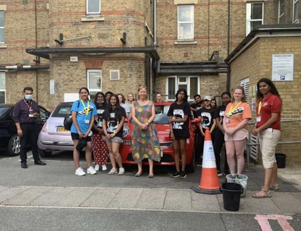 13 teenagers washed staff cars and all money raised was donated to NHS Charities Together. Image Credit: West London NHS Trust