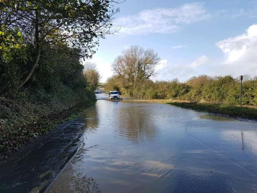 A member of the public in a 4x4 eventually managed to tow the vehicle to safety