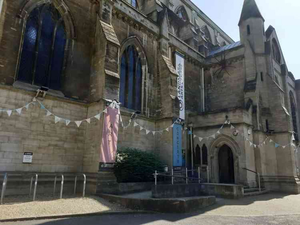 Vintage bunting, made by a local volunteer, captures the wartime spirit