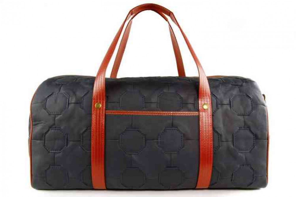 Elegant handbags made out of old fire hoses