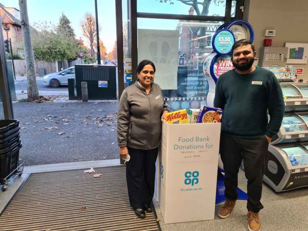 Sasheela and her colleague Anthony inside the supermarket