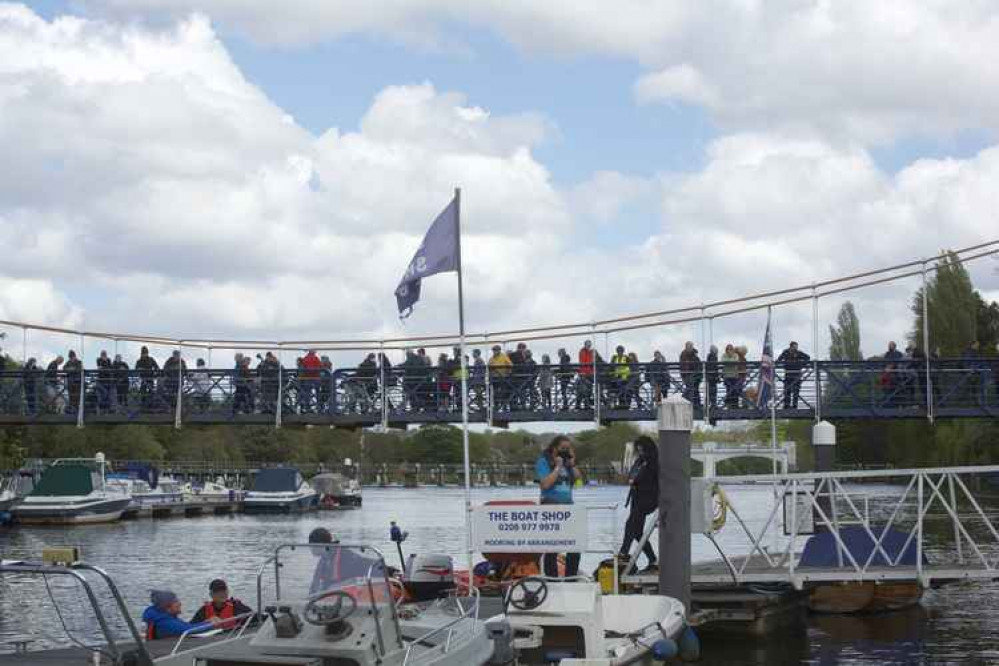 Hundreds of people lined Teddington footbridge to catch a glimpse of the calf