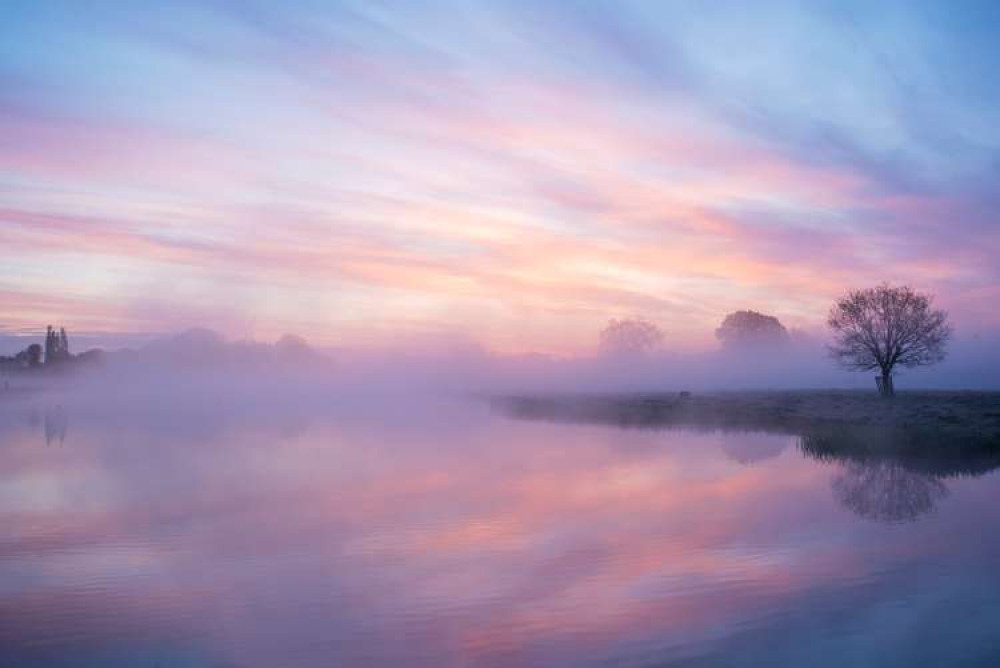 A throwback photo to this beautiful sunrise in Bushy Park, Teddington, this summer (Image: Sue Lindeberg)