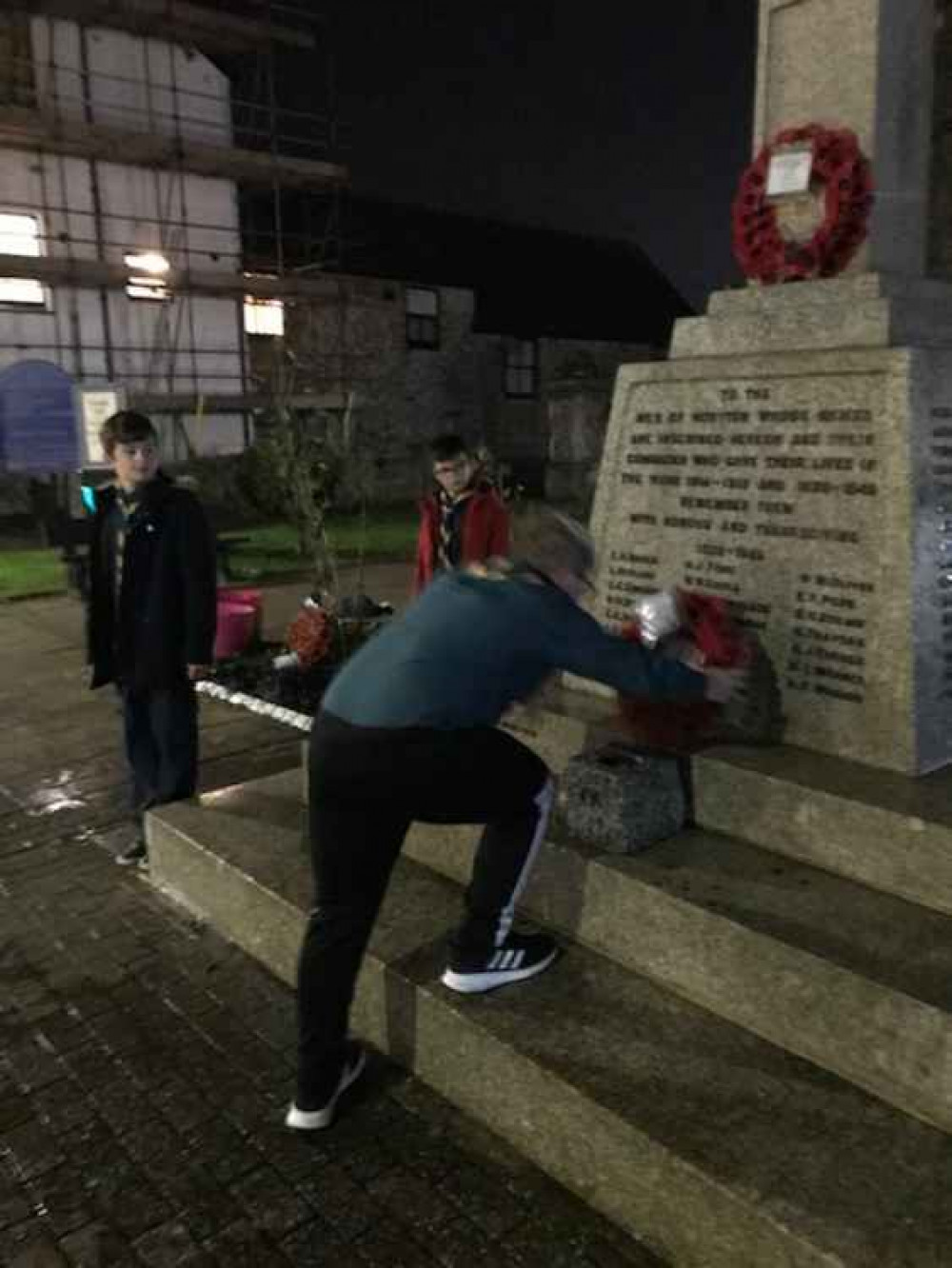 Billy laying our Scout Wreath