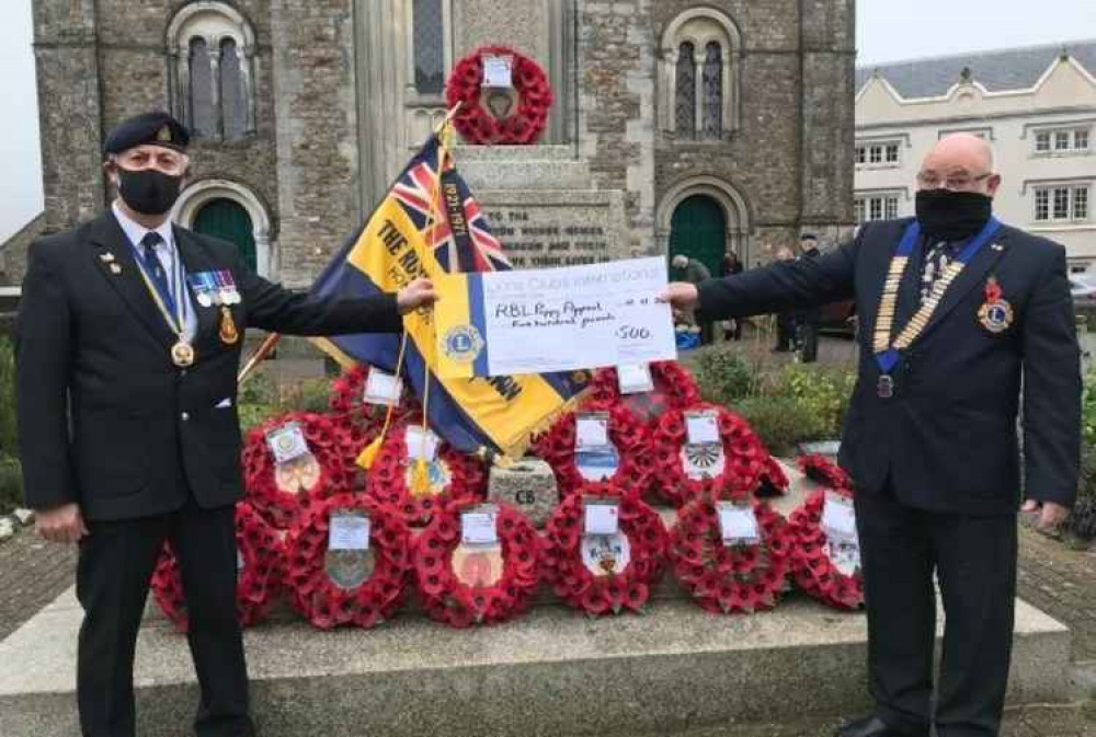 (L-R) Chairman of Royal British Legion Honiton, Paul S Shaw, receives cheque for £500 in support of the Poppy Appeal from Brian Richards, President of Honiton and District Lions Club