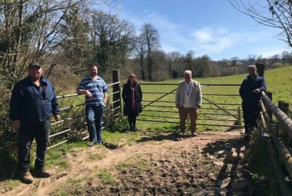 Council members and contractors at the entrance to where the allotments will be