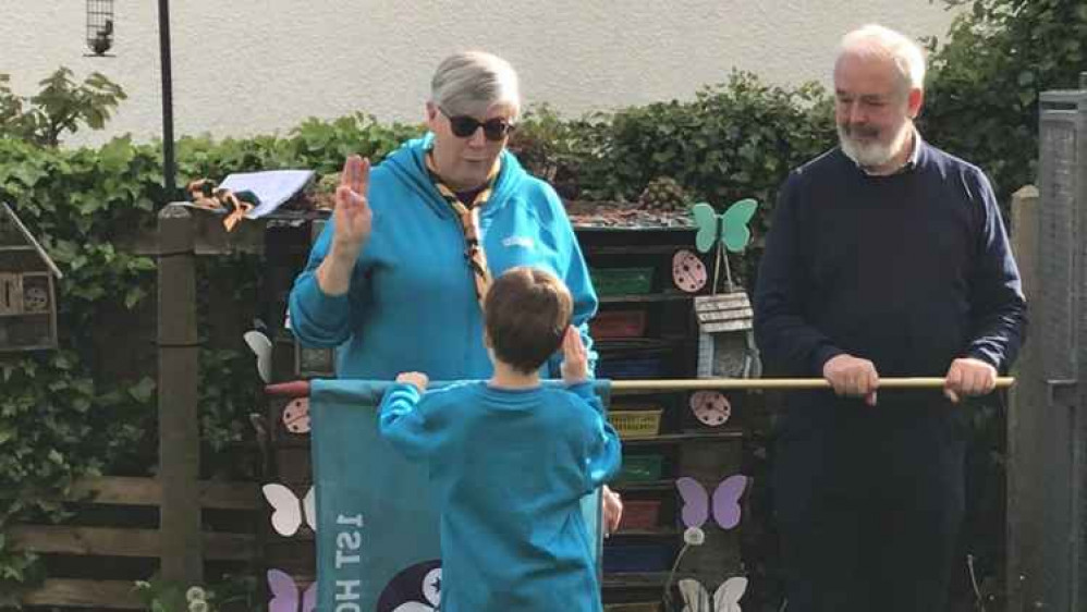 Ernie making his Promise with Grandad holding the flag