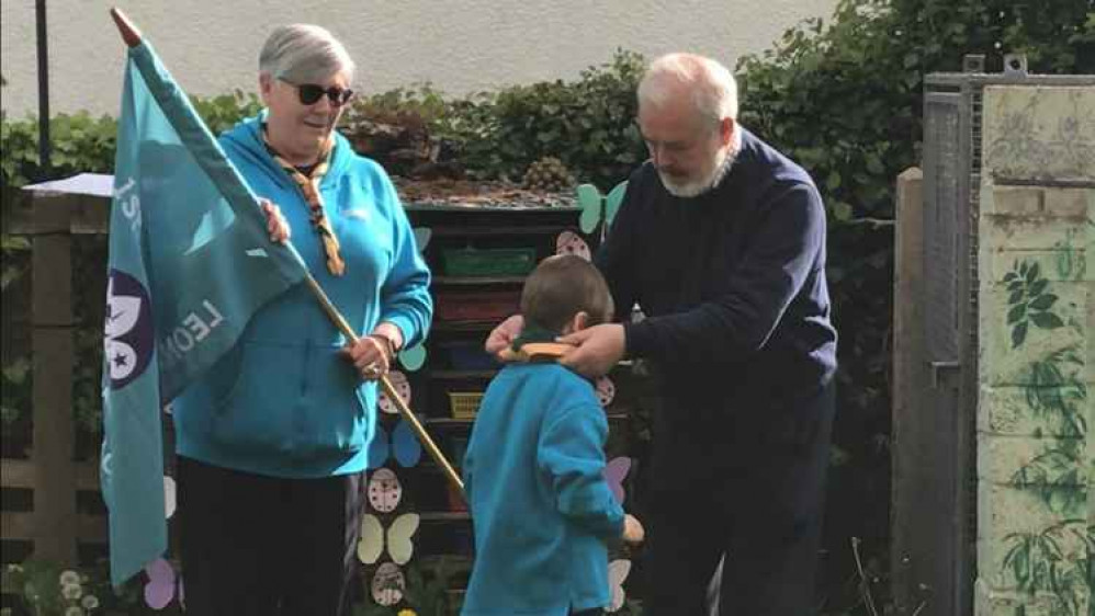 Ernie getting his Scarf and Woggle put on by Grandad