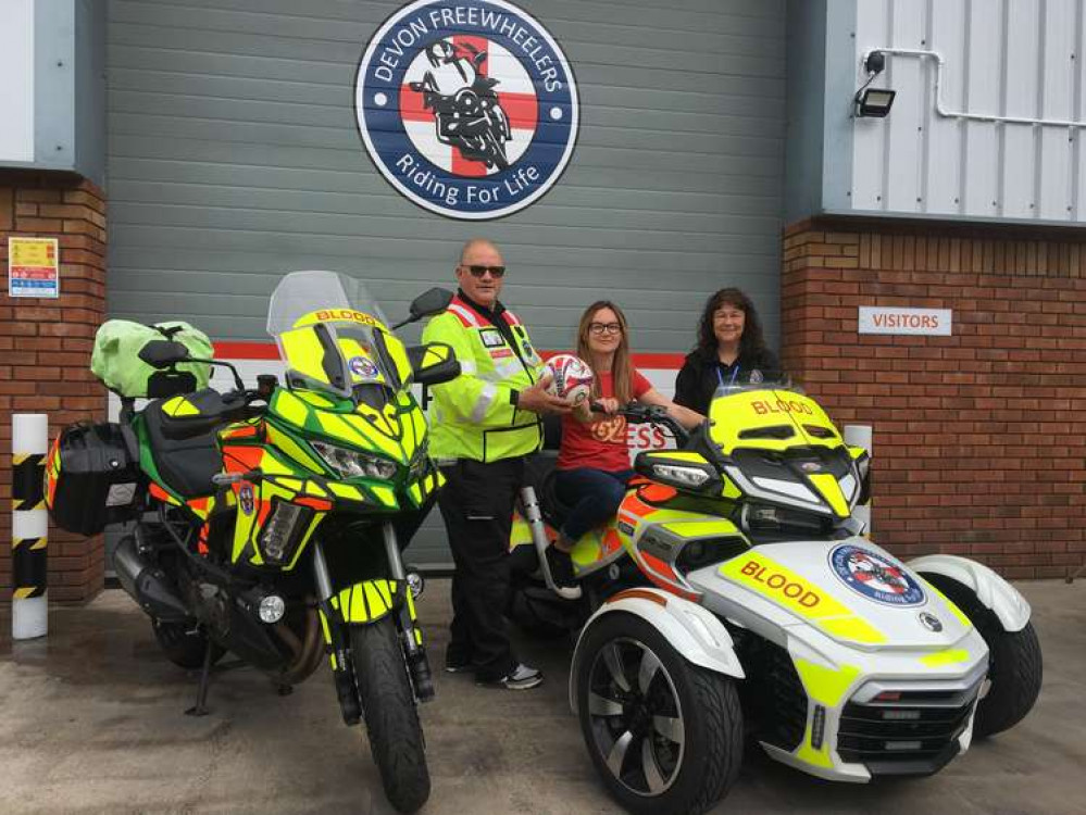 Kelly Lawson, centre, with Devon Freewheelers deputy CEO Russell Roe, and Executive Assistant, Vikki Finney, right. Photo: Devon Freewheelers