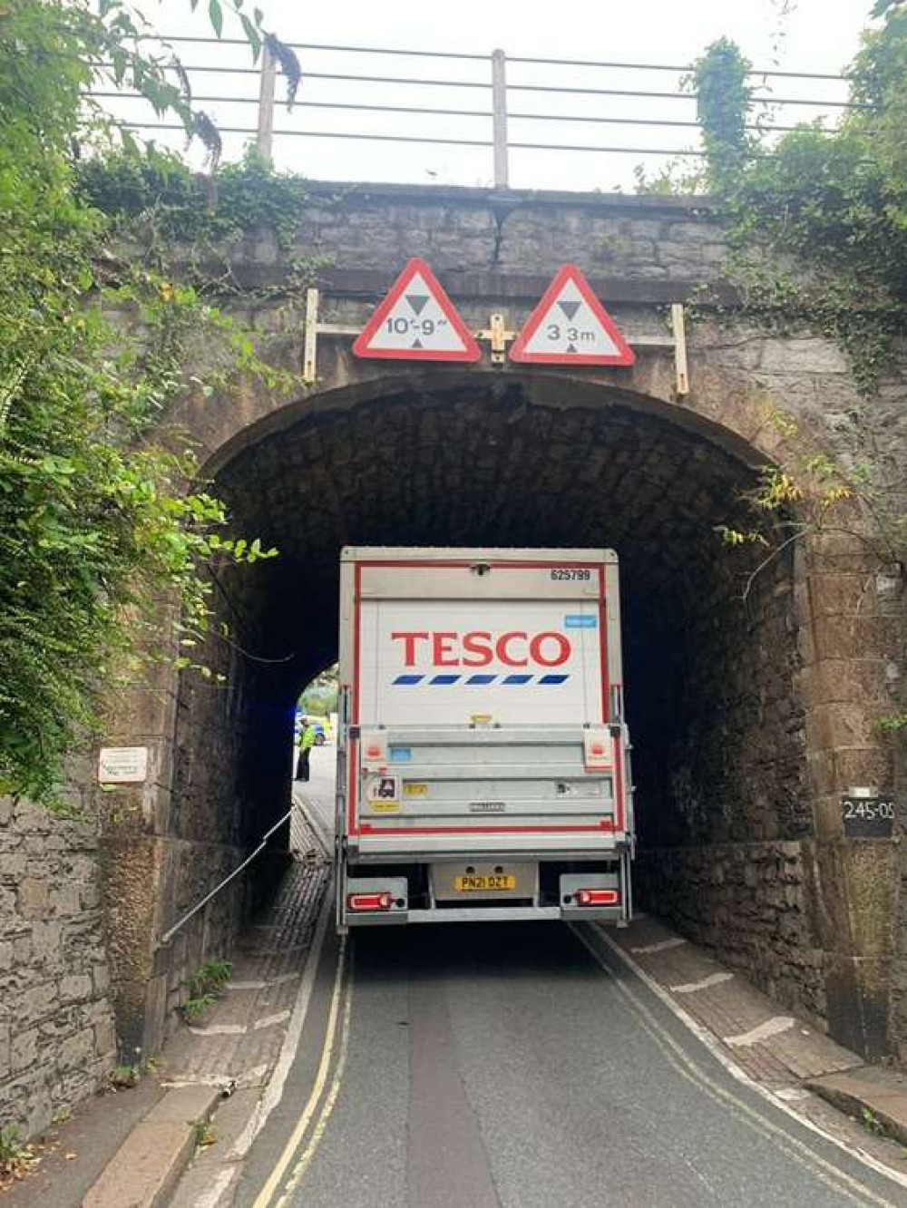 The lorry wedged under the bridge at Lipson Vale, Plymouth