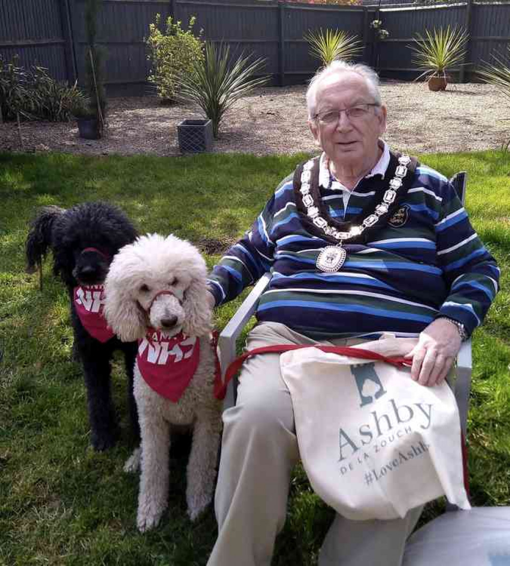 Ashy Mayor Graham Allman with one of the linen bags given to health workers in the town