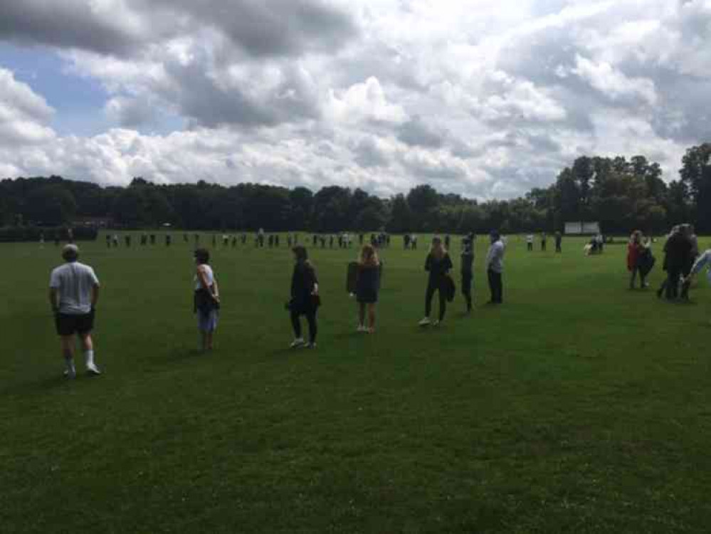 Protesters formed a socially distanced circle at the Bath Grounds