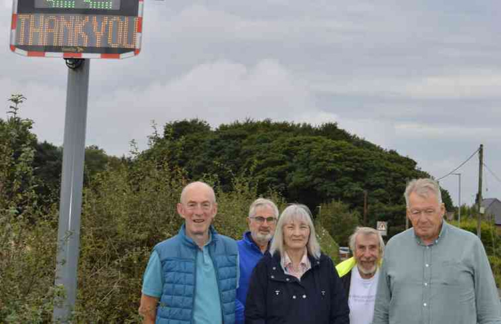 From left to right, Simon Best, Lawrie Newton and Brian Hammond (Blackfordby residents) with Councillors Mrs Gill Hoult and John Coxon at the speed awareness camera in Health Lane, Blackfordby. Photo: Ashby de la Zouch Town Council