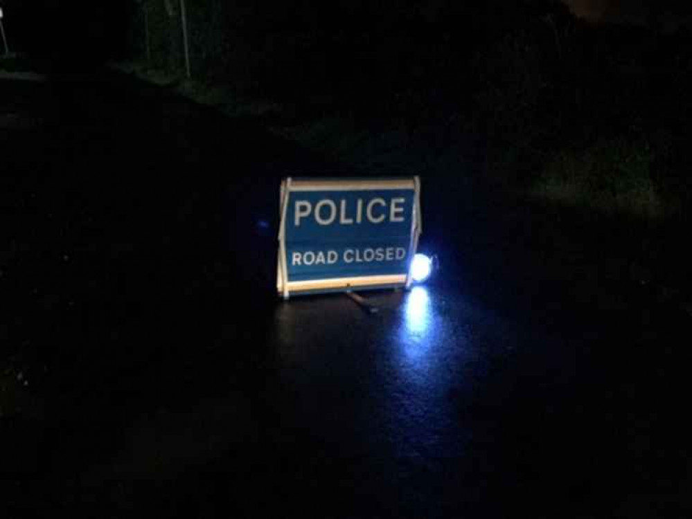 Police closed off the approach to the farm on Spring Lane