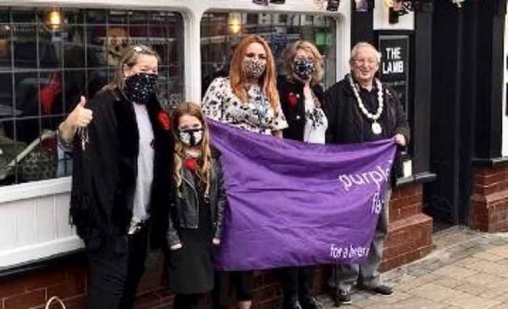 The Mayor and Mayoress with Alex Stanley outside The Lamb