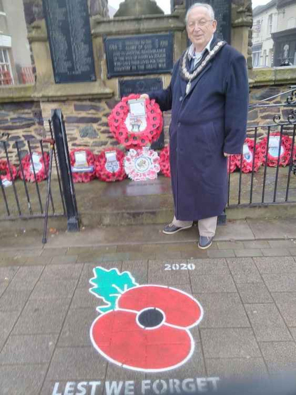 Cllr Allman in front of Ashby's War Memorial