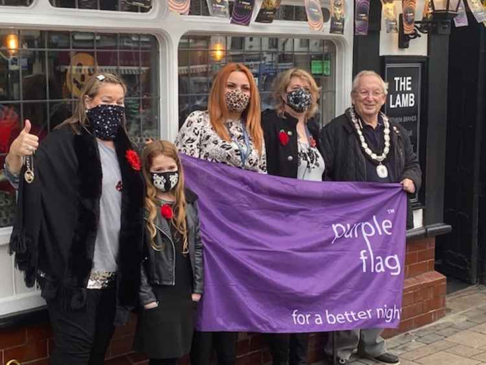 Happier Times: Alex Stanley (centre) helps the Mayor and Mayoress of Ashby mark the town's Purple Flag status