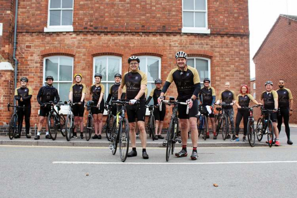 Wills & Trusts founder David Batchelor (front left) and Chief Operating Officer Stuart Payne (front right) with members of the team