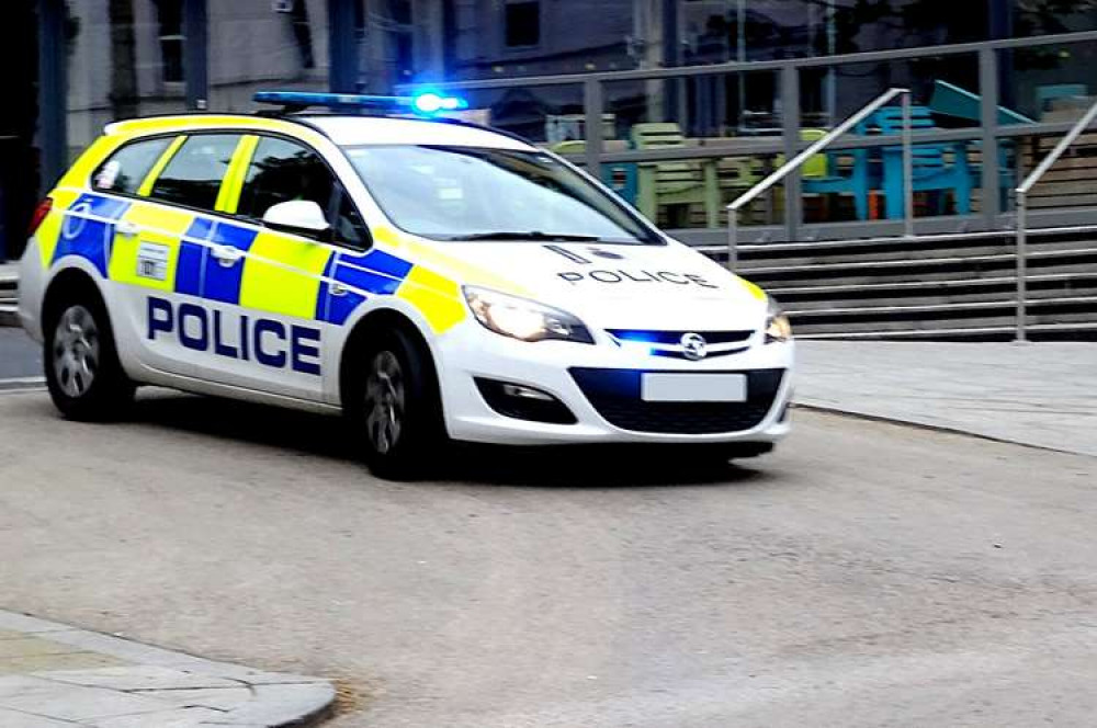 'Blue Flashing Lights British Police Car' licensed for use under CC0 Public Domain from www.publicdomainpictures.net.