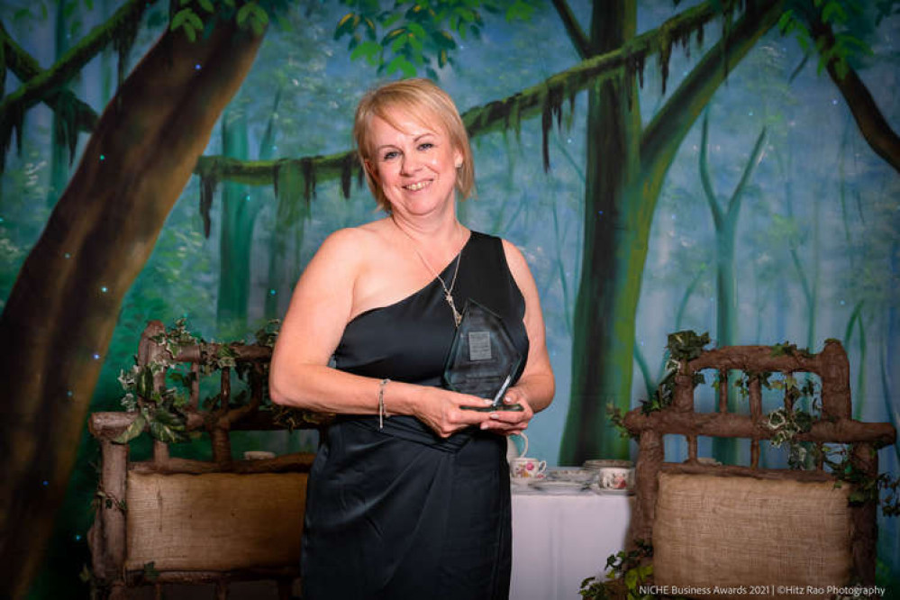 Nicki Robson with the Businesswoman of the Year award