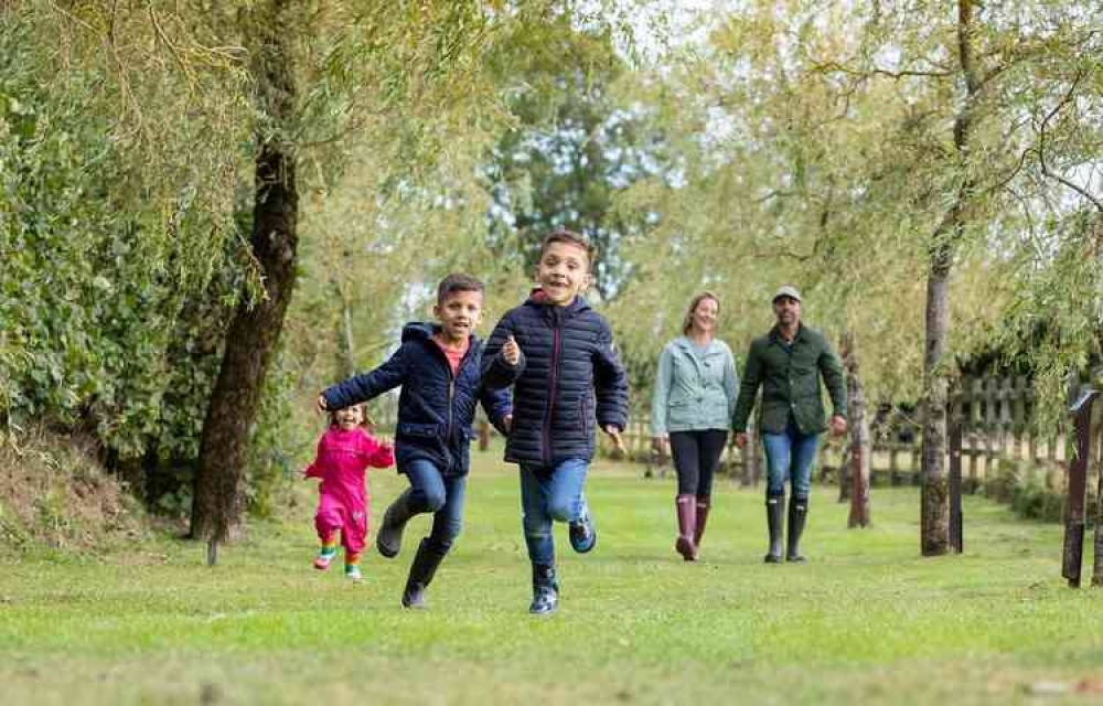 A family enjoying time at The Donkey Sanctuary.