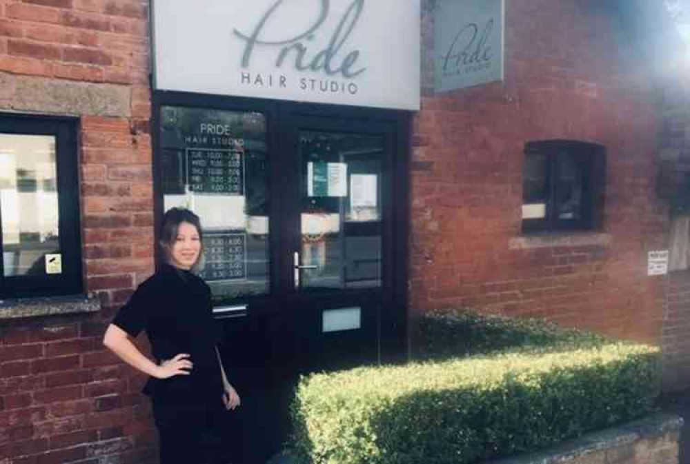 Elena outside her salon, Pride Hair Studio, in Newton Poppleford