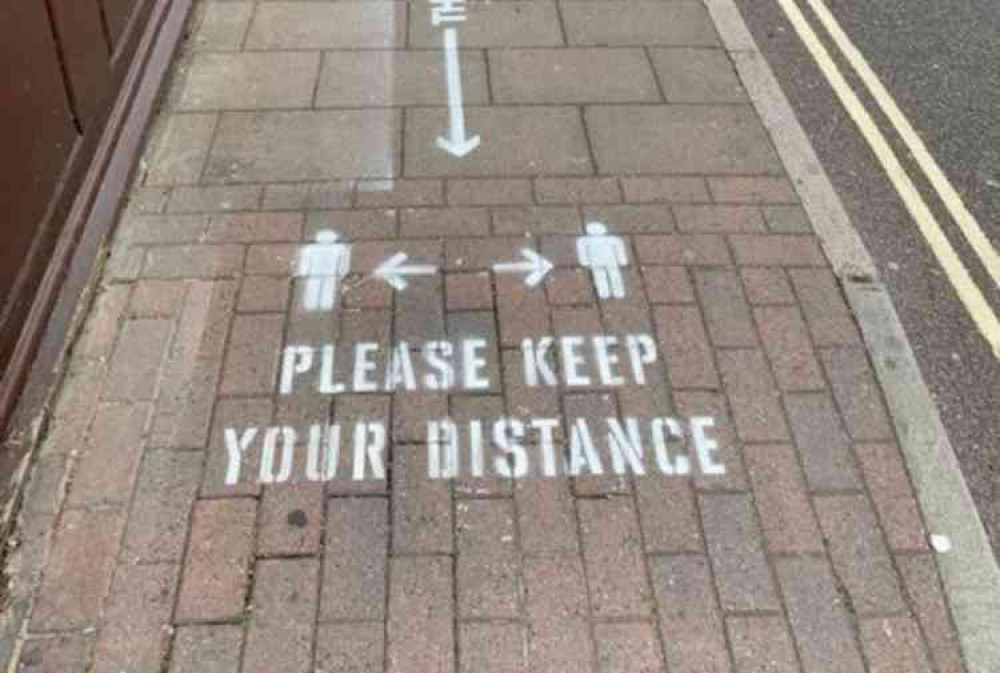 Two metre social distancing stencils have been installed in Sidmouth. Image courtesy of Stuart Hughes.