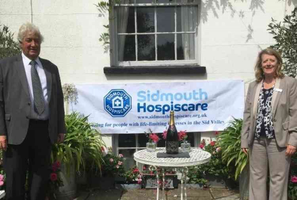 David Cook, Chair of Sidmouth Hospiscare and Caroline Sparks, Office Manager. Image courtesy of Sidmouth Hospiscare.