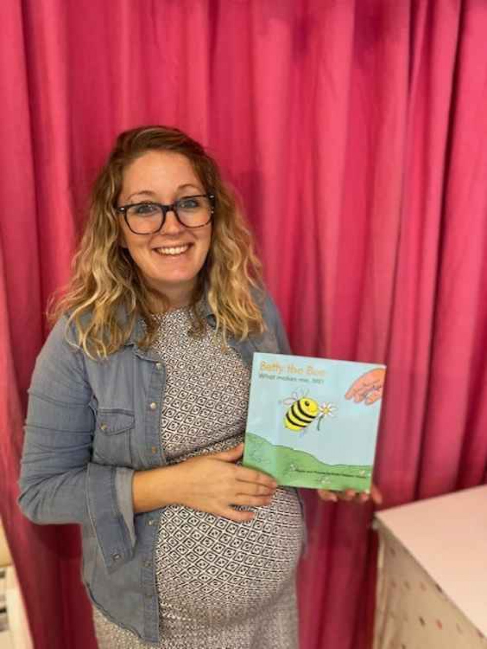 Emily with new book; Betty the Bee, what makes me ME!