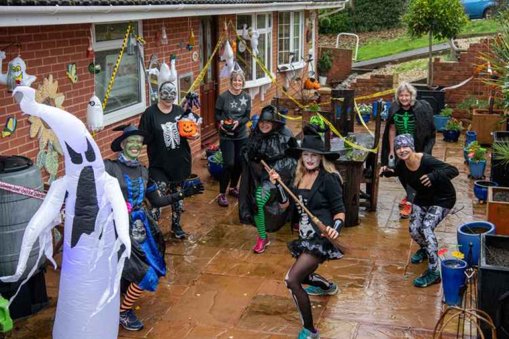 Runners at the ready, in full Halloween gear, despite the weather. Credit: Kyle Baker