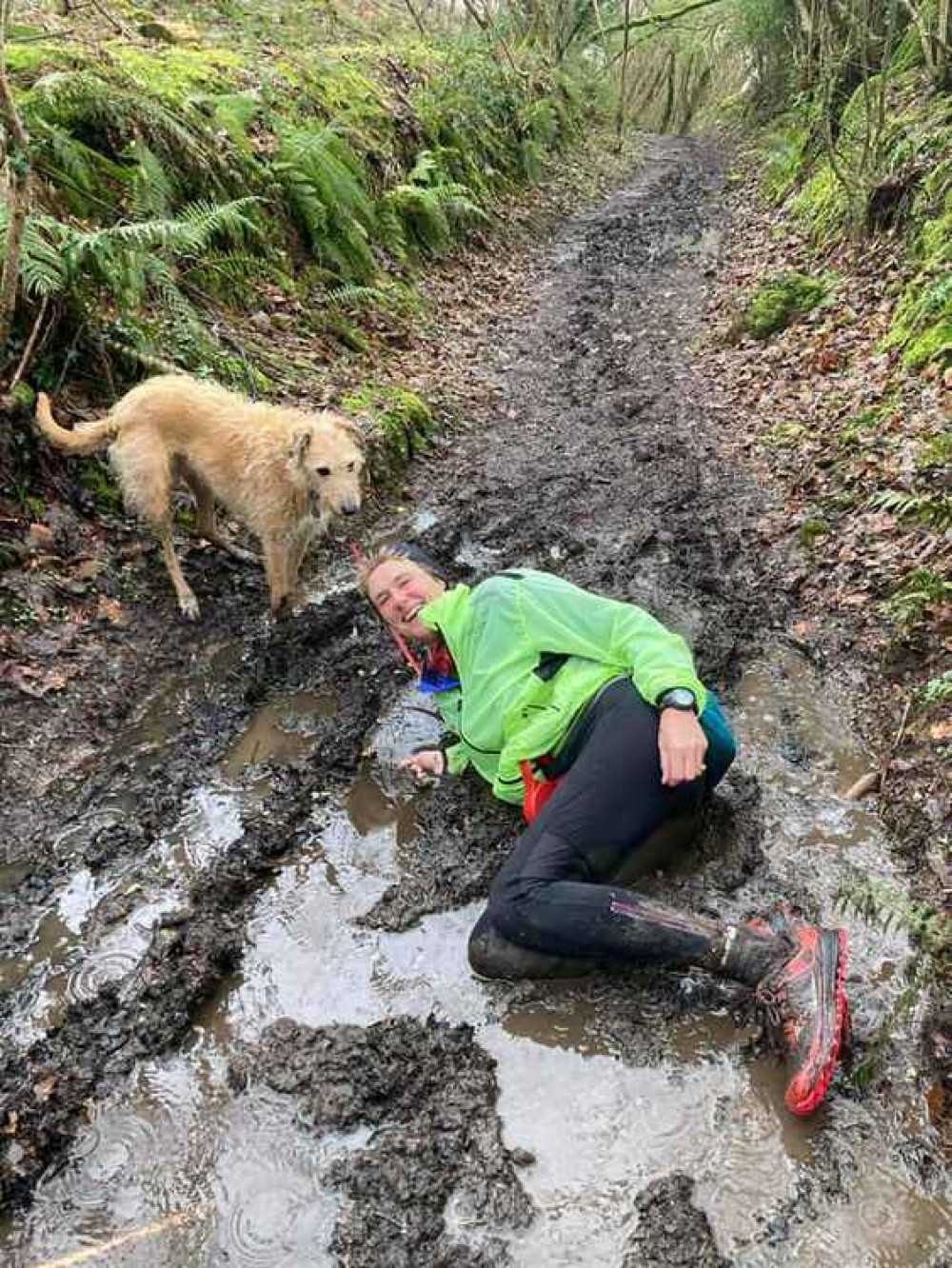 Jo Earlam embracing the mud