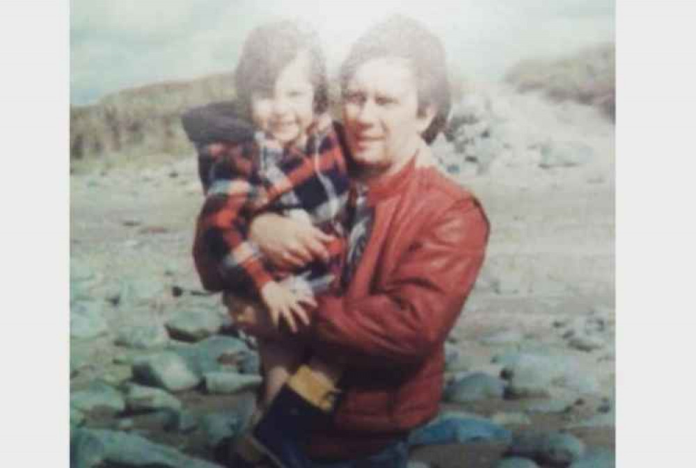 Samantha Crow as a child, with her father