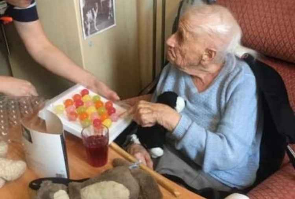 Former Arcot House resident Topsy enjoying jelly drops