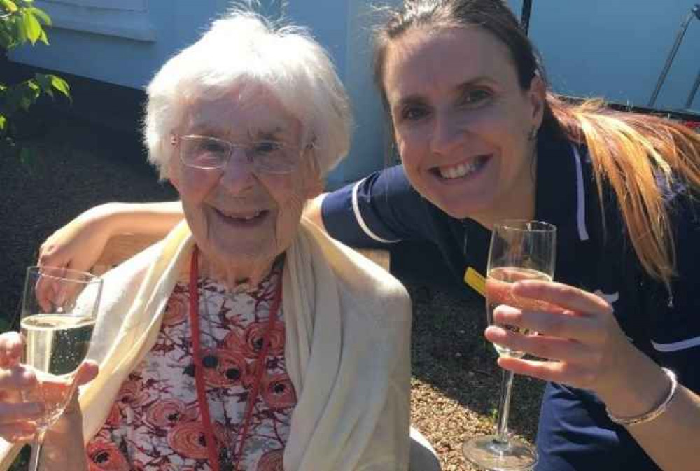 Sam celebrating five stars with resident Eileen