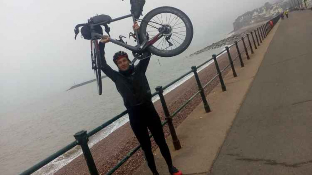 George with his bike on Sidmouth seafront