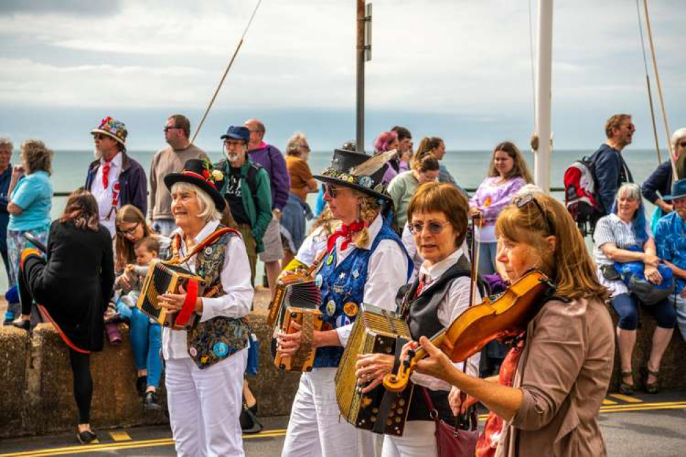 Morris dancers on the seafront. Photo by Kyle Baker Photography & Videography