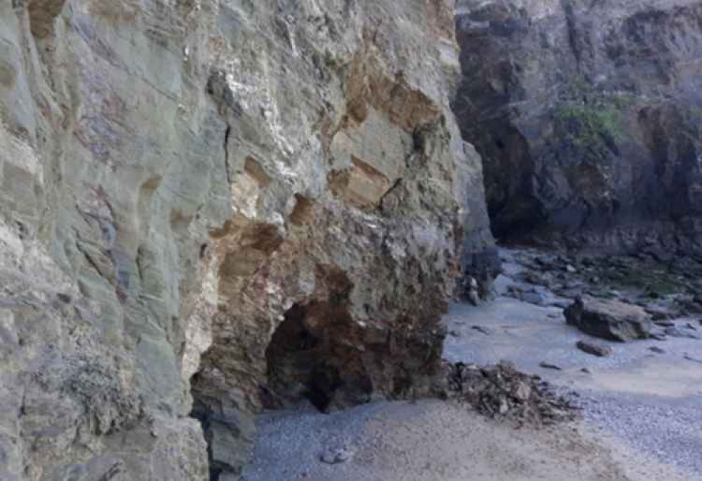 Beach goers have been warned about rocks falling following recent incidents.