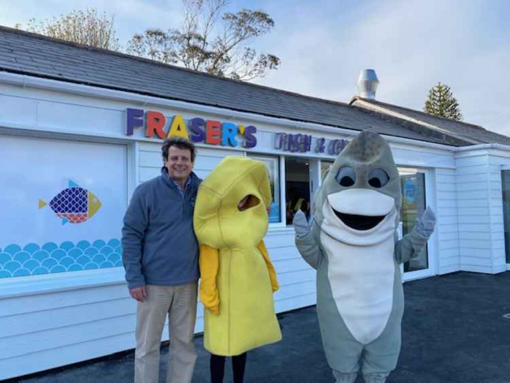 Pete Fraser with the shop mascots.