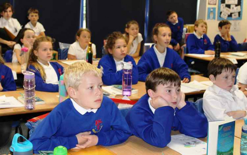 Pupils from Ashcott School enjoying a virtual visit from author Abi Elphinstone