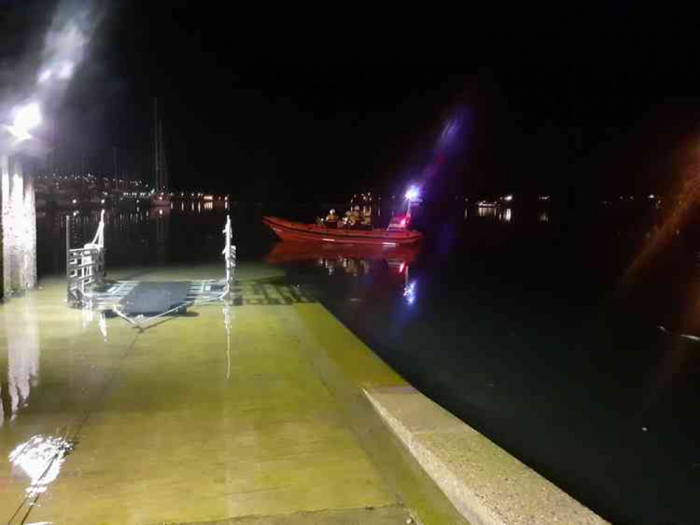 Image shows the volunteer crew and inshore lifeboat heading out to the rescue (Falmouth RNLI) Image shows the volunteer crew and inshore lifeboat heading out to the rescue (Falmouth RNLI)