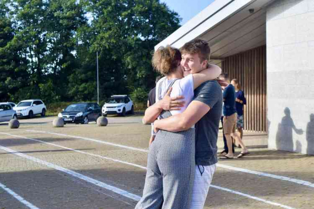 Blain Mock celebrates his exam results with his mother Blain Mock celebrates his exam results with his mother