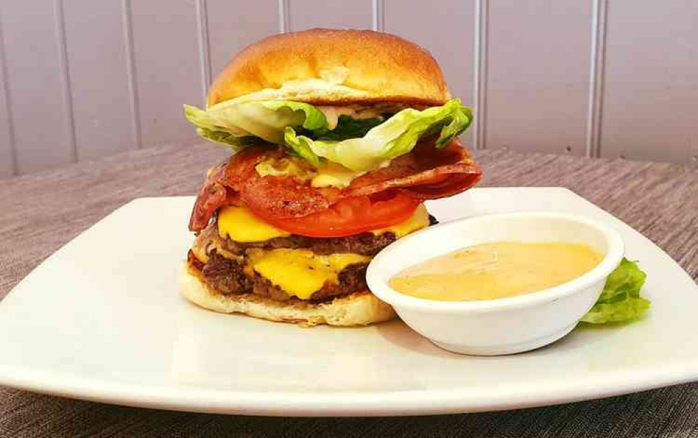 Burgers at Cafe Strand. Credit: Cafe Strand Burgers at Cafe Strand. Credit: Cafe Strand