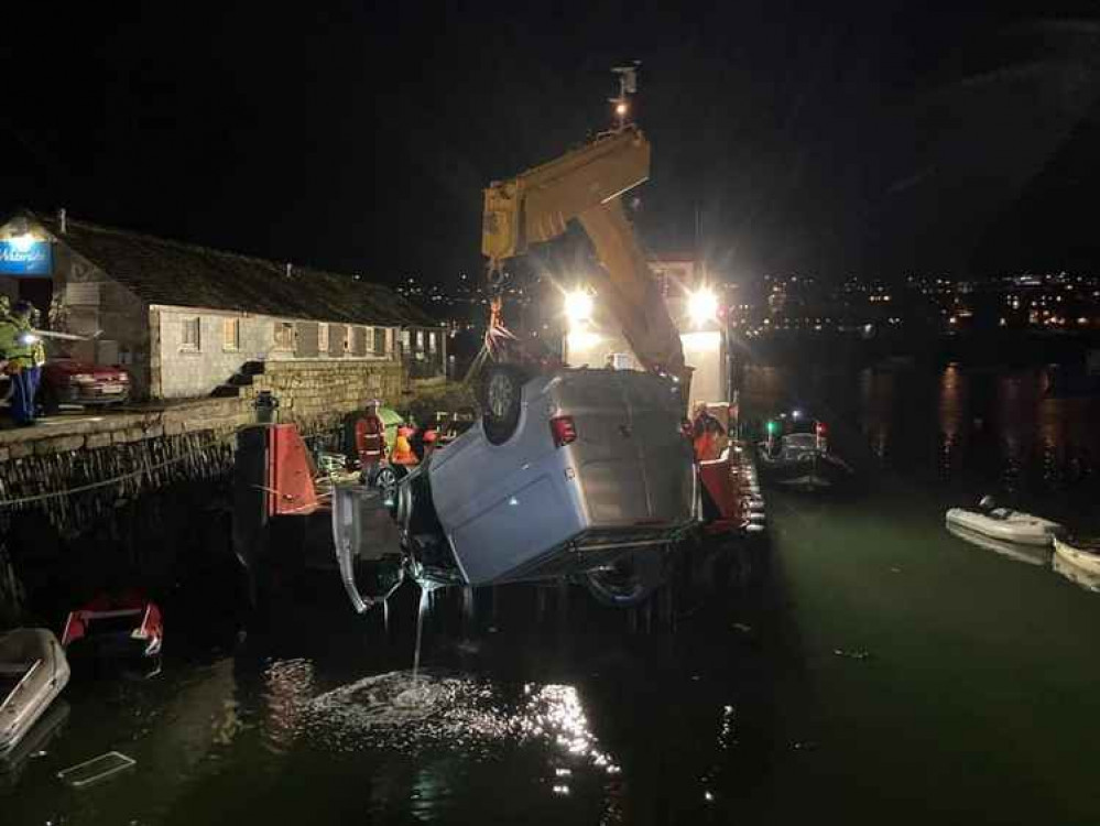 The van being lifted out of the water. Credit: Falmouth Coastguard Rescue Team