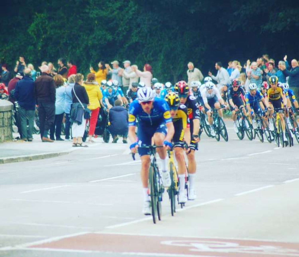 Photo of the cyclists going through Penryn, taken by Christopher Thom.